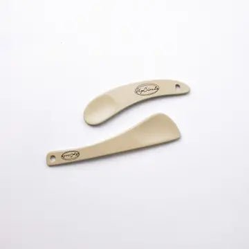 A duo of vegan, upcycled spatulas for hygienic application of LOC Cleansing Balm and moisturizers.